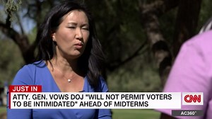 Woman confronts armed man near ballot drop box