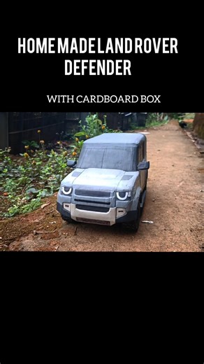 home made land rover defender with cardboard box at home