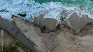 Windansea beach and surfer shack in La Jolla, California. Top down drone view.