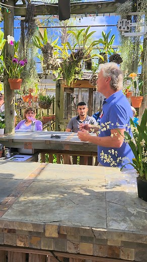 Scott Peplin shows the FLOS Keiki's how to repot an orchid at his Orchid Grill & Bar #FLOS #FortLauderdale #SouthFloridaOrchids #FortLauderdaleOrchidSociety #OrchidObsession #OrchidEnvironments | Fort Lauderdale Orchid Society