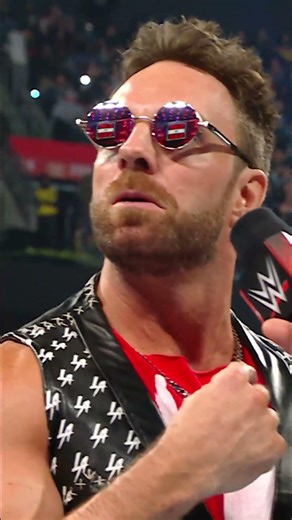 “American Badass” Undertaker rides his motorcycle to the ring to confront LA Knight