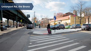 This year, we implemented pedestrian accessibility improvements along Unionport Rd (Westchester to Starling Aves) in #theBronx. This project constructed the existing painted medians to be more accessible and will include new streets trees in the next planting season. #nycdot2022 [Video description: before and after photos of a new concrete pedestrian island with red pedestrian ramps installed next to elevated train tracks.] | NYC DOT