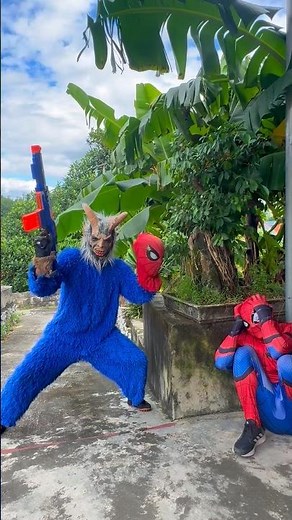 Ferocious Monster Using Heavy Guns Attacks Spider-Man