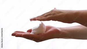Woman hand are washing with soap bubbles. Closeup young Asian woman washing hands by soap for cleanliness and prevent germs coronavirus, Healthcare medical COVID-19 virus concept. White Background.
