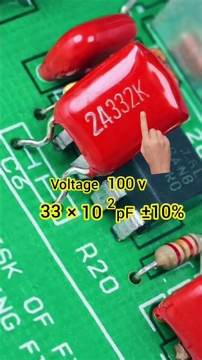 The value of the capacitor labeled three three two.