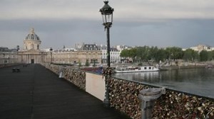 Part of iconic Paris bridge collapses from ‘love locks’ craze