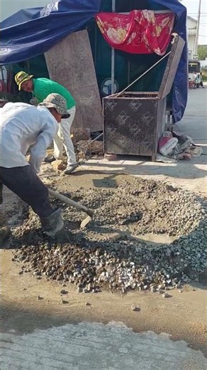 Concrete hand mixing by non skill worker #construction #contractor #workers