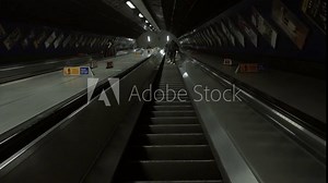 riding up escalator in London underground metro train station England UK 4K 1080