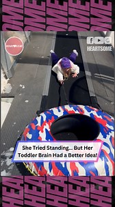 When standing doesn’t work, ride like royalty! This kid’s sled lift strategy is pure genius—and so relatable. #sleddingfail #funnykids #winterfun #kidshumor #viralvideo #wooglobe | Heartsome