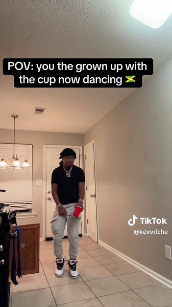 Grown Up Dancing with a Cup: A Fun Perspective