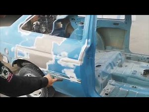 Soda blasting paint from a car body