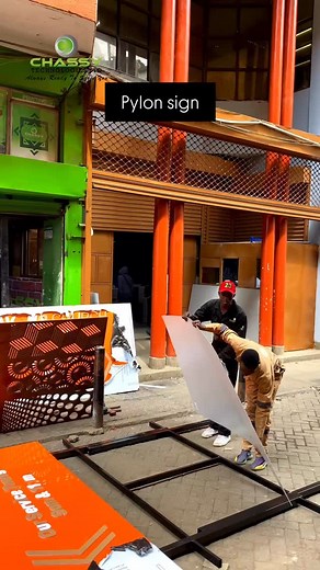 Your brand. Unmissable. 🔝 > Witness the making of a dominant pylon sign – built for maximum visibility day or night. 🌆🌃 > We handle structure, lighting, engineering & install. > Ready to own the skyline? ✨ How tall is too tall? 😉 > When your client says *“Make it visible from SPACE!” … we deliver. 🚀 > (Plot twist: It’s all math, muscle & laser-focused skill) > #SignFabrication #WorkshopHustle #EngineeringWonders #MadeInKenya #WeldingLife #FYP > #PylonSignage #OutdoorAdvertising #BrandIdenti
