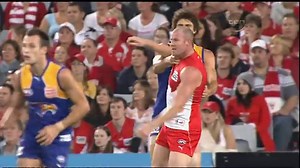 Former Swans star Barry Hall clobbers opponent in local footy final