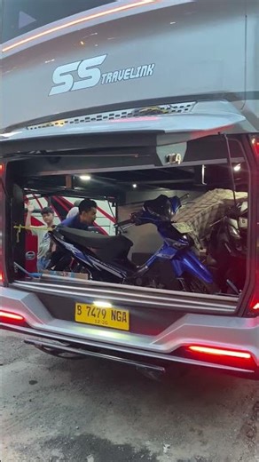 Super spacious bus trunk for motorbikes