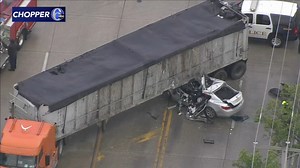 1 dead, 1 injured after car pinned under tractor-trailer near Commodore Barry Bridge; baby unharmed