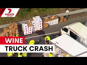 Wine truck crash causes M1 pile-up | 7NEWS