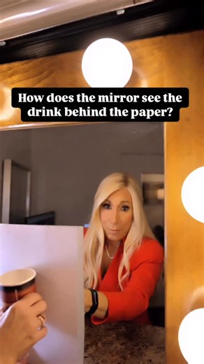 How does the mirror see the drink behind the paper? #mirror #spooky #spookyseason | Lori Greiner