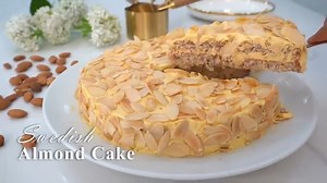IKEA SWEDISH ALMOND CAKE Ikea Swedish Almond Cake How to make a flourless Swedish Almond Cake. Here's what you'll need: Cream Frosting: 4 egg yolks 1/3 cup sugar (70g) 1/2 cup cream (120ml) 1 teaspoon vanilla extract (5ml) 1/2 cup slightly salted butter (115g) Base: 4 eggwhites 1/3 cup sugar (70g) 1 and 1/2 cup ground almonds (150g) Topping: 1/2 cup almond flakes (50g) | Savor Easy