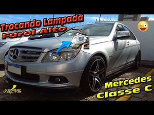 Replacement of the front headlight bulb of the Mercedes C-Class.