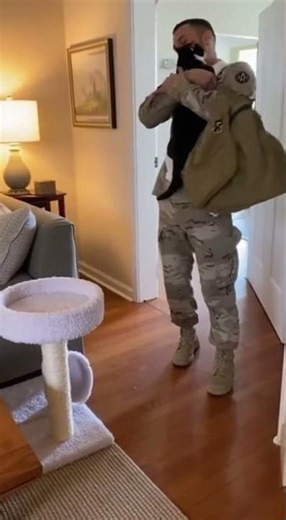Cat Welcomes Soldier Home with a Hug