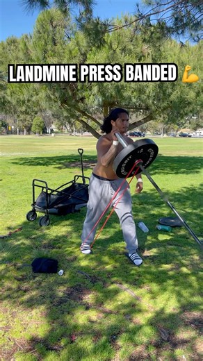 Banded Landmine Press Chest exercise.