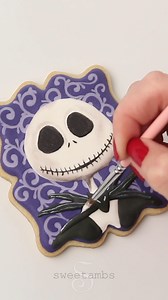 1.2M views · 6.7K reactions | Jack and Sally make such a nice couple, don't they? 殺 I made these cookies with royal icing, food coloring, and luster dust. | SweetAmbs | Facebook