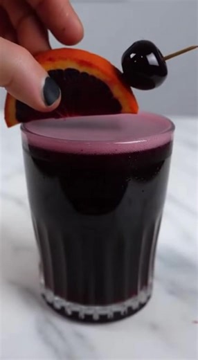 Unleash your inner vampire with this quick & easy Vampire's Kiss Cocktail recipe! Perfect for Halloween or a gothic night in. Follow our mesmerizing visual guide and sip the night away! Recipe details in the comments below. #VampireKiss #CocktailRecipe #HalloweenDrinks #GothicCocktail #SpookySeason #EasyCocktails | MealDelights