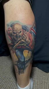 Here’s a healed and fresh video of the iron maiden leg I’m currently working on . The main back of the calf is healed , the flag and brave new world background are fresh . Having so much fun working on this piece , looking forward to next session !Any guesses on the next Eddie artwork to go on the leg ??? #ironmaiden #eddie #ironmaidentattoo #troopertattoo #starrproteam #ghostcartridges #revolutionink | Matt Oddboy Barratt-Jones
