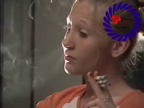 YOUNG GIRL SMOKING 3 CIG AT ONCE.MP4