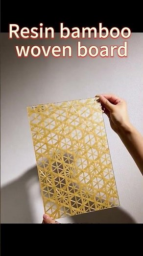 Resin bamboo woven board