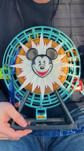 Disney California Adventure Pixar Pal-A-Round Popcorn Bucket pricing and purchase locations are as follows. Mobile order will only be available for the first few days. Pricing may vary depending on where you purchase it, since each location includes different snacks. Mobile order locations appear to be priced at $50.99, while popcorn carts will be $55. | David Vaughn