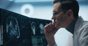Neurologist Examines Intricate Brain Scans on Multiple Screens. Advanced Neuroimaging Technology Reveals Complex Neural Pathways, Display Showing CT Scan in a Modern Medical Environment.