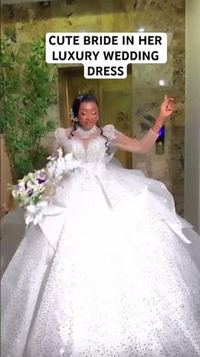 CUTE BRIDE IN HER LUXURY WEDDING DRESS