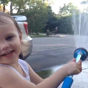 How did I forget how much fun it is to play with the hose?! We made a sprinkler before this and she loved it. She's dripping wet! Lol #hosefun #sprinkler #summertime #3yearsold #summeractivity #outside #nobathingsuit #thatsok #daughter #lovethisgirl #laughter | Jill Kay