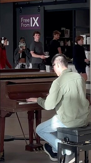 Pianist summons orchestra in cafeteria (Shostakovich waltz 2 flash mob)