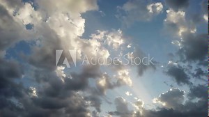 Awesome 4K timelapse of banks of clouds with light effects and scenic movement in the air