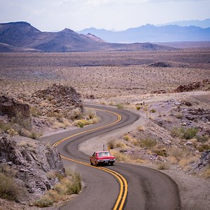 Nestled in the Black Mountains of Western Arizona, Oatman is a small town brimming with Wild West charm and history. It’s one of the most unique and colorful stops on Route 66, and its rich mining history, iconic gunfights, and cowboy atmosphere make it an unforgettable destination for adventurers and history buffs alike. | Visit USA Parks