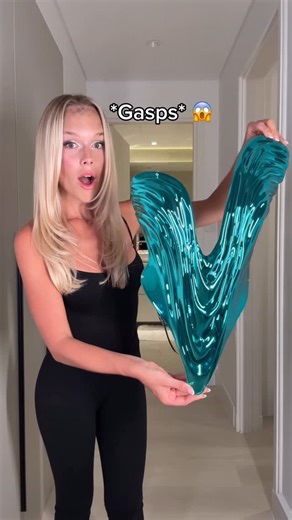 SweaStyle on Instagram: "Can I style this top for my Halloween Costume?  Follow my account @sweastyle for more fashion videos!  Get ready with me for Halloween by styling this blue metallic top with a DIY homemade seashell skirt for my Siren Halloween costume! should I keep the skirt like this or put the shells all the way or wear a completely different skirt? 隆‍♀️ #HalloweenCostume #Siren #GRWMhalloween #MetallicTop"