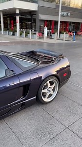 Capturing the refined essence of performance, the NSX in Midnight Pearl PB-73P glows against the cityscape—a modern classic in its prime. #NSX #PrecisionCraftedPerformance 📷: @shihtake | Classic Trader