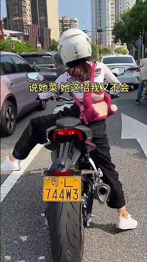 Short legs are quite busy waiting for the traffic light