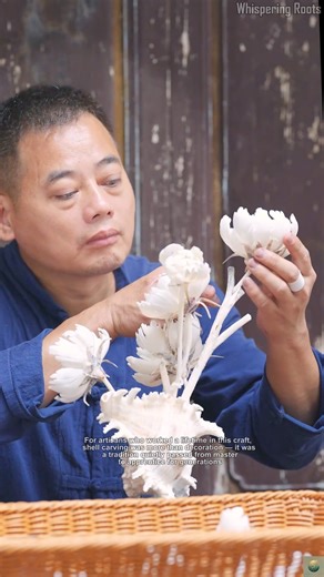 Whispering Roots 🌿✨ on Instagram: "Seashells Turn Into Flowers : A 60-Year-Old Art Comes Alive When seashells meet the elegance of the peony, a quiet miracle appears. Shell carving is an art filled with patience, precision, and a lifetime of devotion. Each layer reveals the ocean’s color; each stroke reflects centuries of craftsmanship. This video shares the beauty of an art preserved across sixty years — delicate, timeless, and deeply human. 🌊🌸 #ShellCarving #IntangibleHeritage #TraditionalC