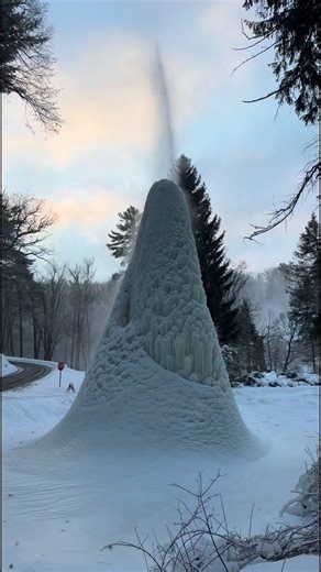 Ice Volcano Ascends—Walk With Me: The frozen fountain, aka “Ice Volcano”, gets taller and taller here in Western New York at Letchworth State Park. Let’s take another icy walk…#winter | John Kucko Digital
