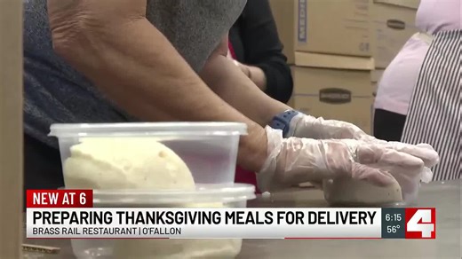 Volunteers at The Brass Rail Restaurant help prep Thanksgiving meals for those in need