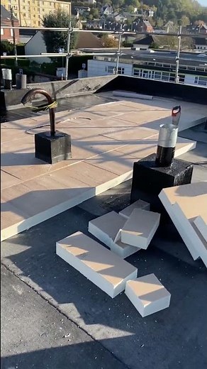 ￼ Pose d’isolation, toiture terrasse ￼