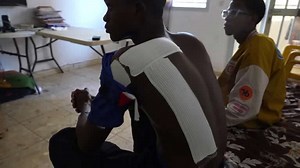 Student wounds paint painful picture of Senegal's debt crisis