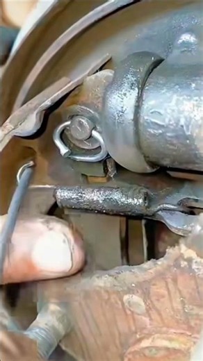 "🔧💪 Brake Spring Mastery: Easy Fit & Secure Lock 🔩🚗"