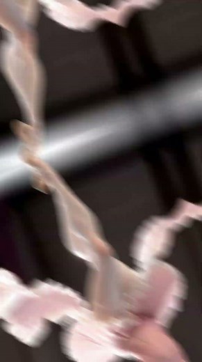 A graceful, nimble dancer twirls and leaps across the pristine, polished floor of a ballet studio ..