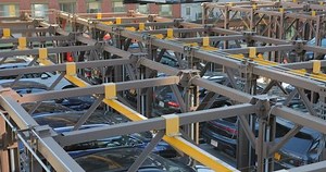 clip-1098556495-stacked-parking-garage-manhattan-new-york-city