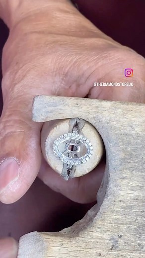 Precision meets passion in the hands of our master stone setter, who carefully handcrafts our Georgina 5ct lab diamond engagement ring.She's a beauty don't you agree 💬👇 #diamondring #5carat #ovalengagementring #ovalcutdiamond #ovaldiamond #haloring #haloengagementring | The Diamond Store