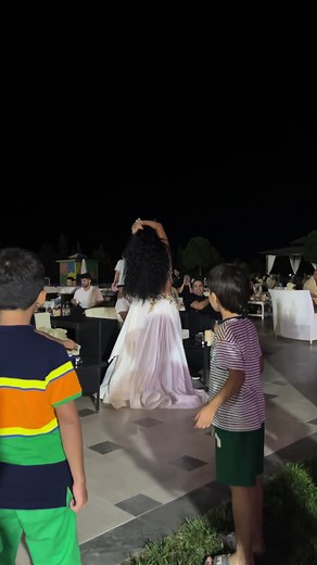 Elegant Belly Dance Performance at Nighttime Event